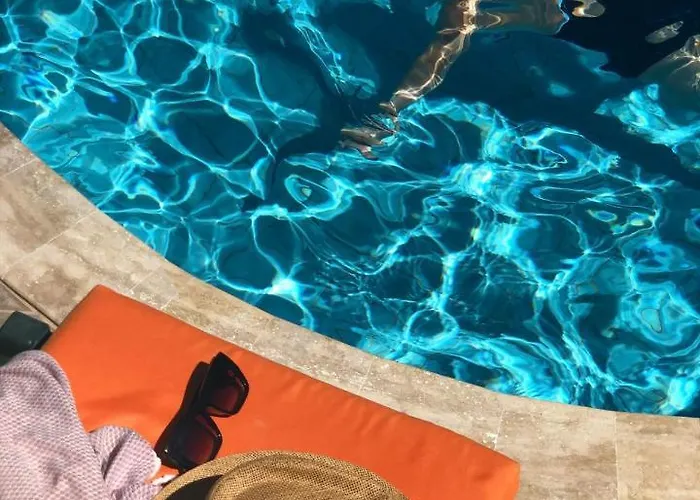 Symbola Ολουντενίζ